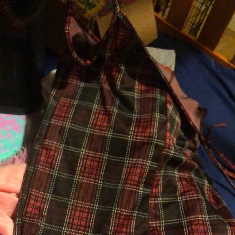 Jumpsuit brand new  HAVE TO WEAR A TANGTOP OR HALF SHIRT SOMETHING UNDER IT